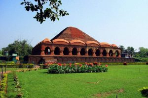 Bishnupur Rasmancha and surrounding lawns on a bright sunny day