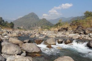 Murti river flowing through the valley surrounded by hills